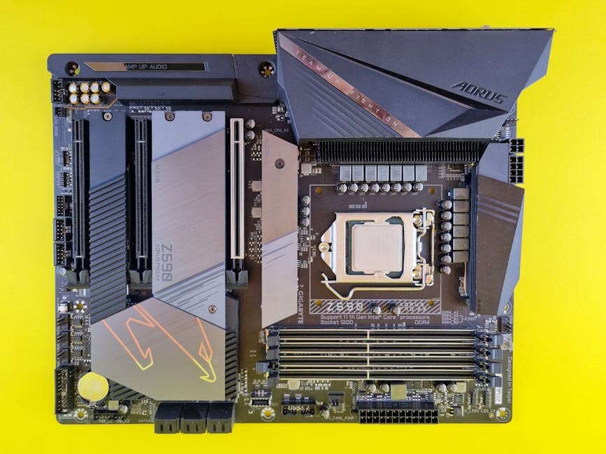 Close-up of a high-performance Aorus motherboard with vibrant yellow background, ideal for tech enthusiasts.