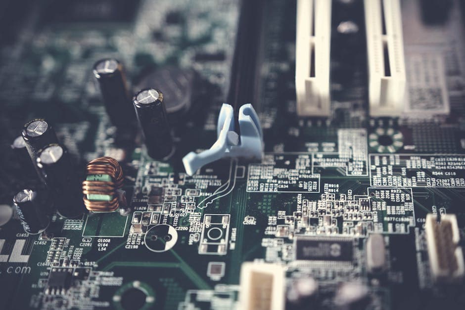 Detailed view of components on a computer motherboard, showcasing technology and circuitry.